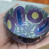 Royal Copenhagen Tenera faience bowl by Kari Christensen, held in a hand for scale
