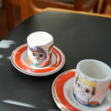 DeSimone hand-painted espresso cups and saucers, in context on the table