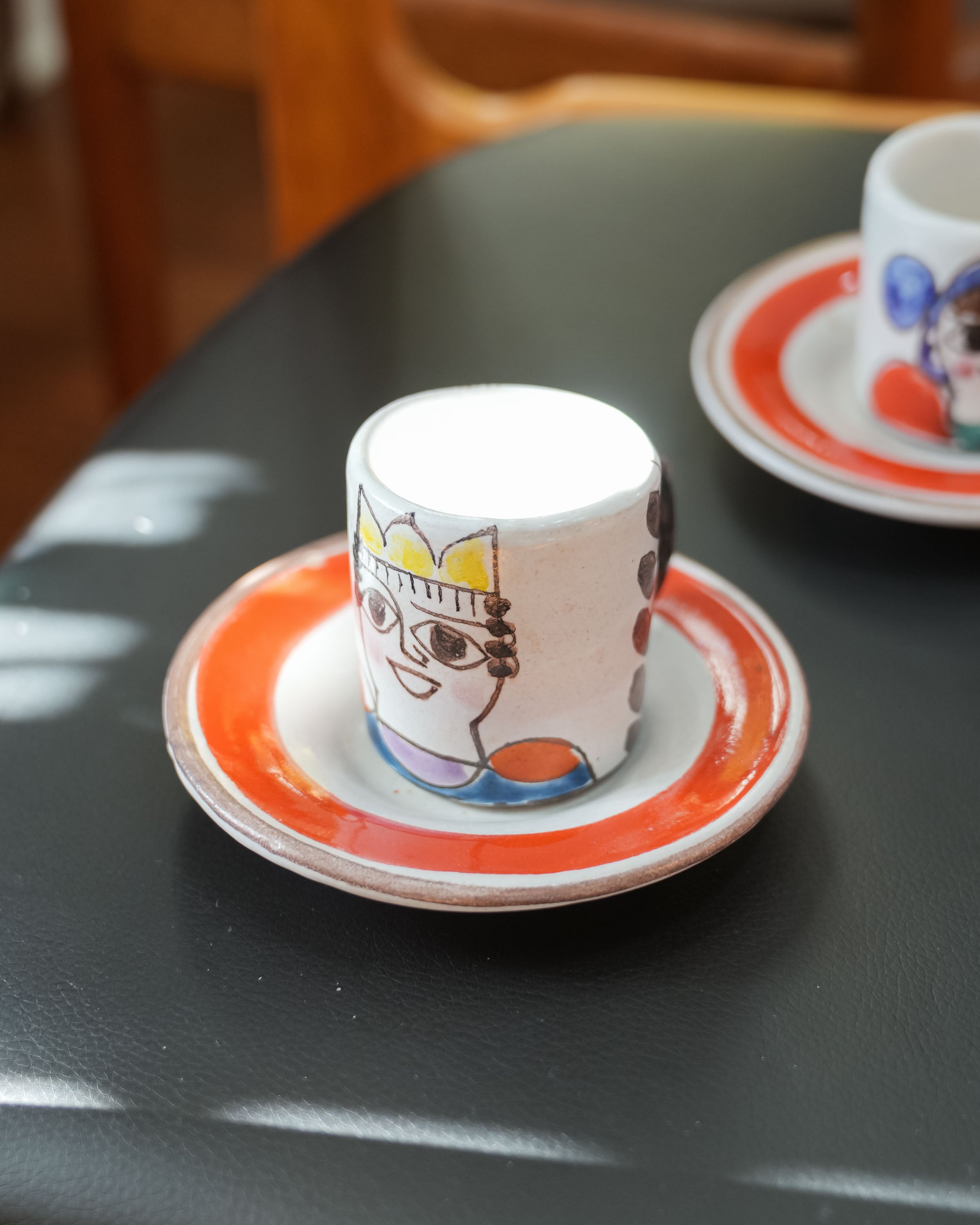 DeSimone hand-painted espresso cups and saucers, in use