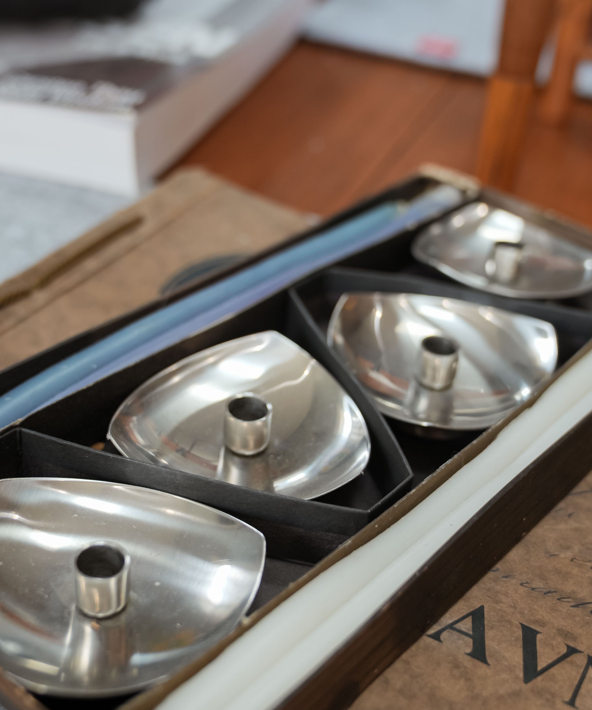 Stelton stainless steel candle holders, set of four, close view of the mark and material