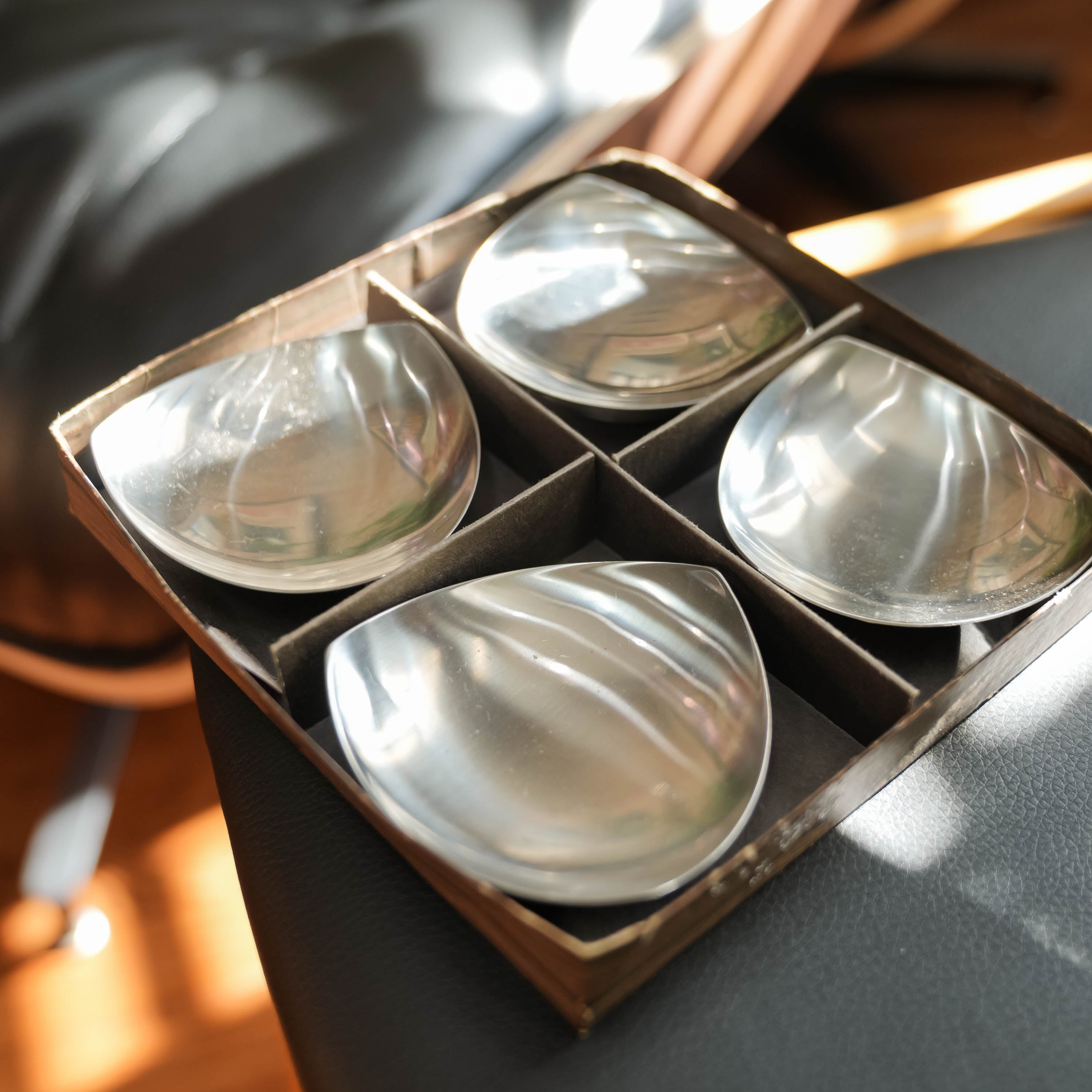 Stelton stainless steel nut dishes, set of four, in context on the table