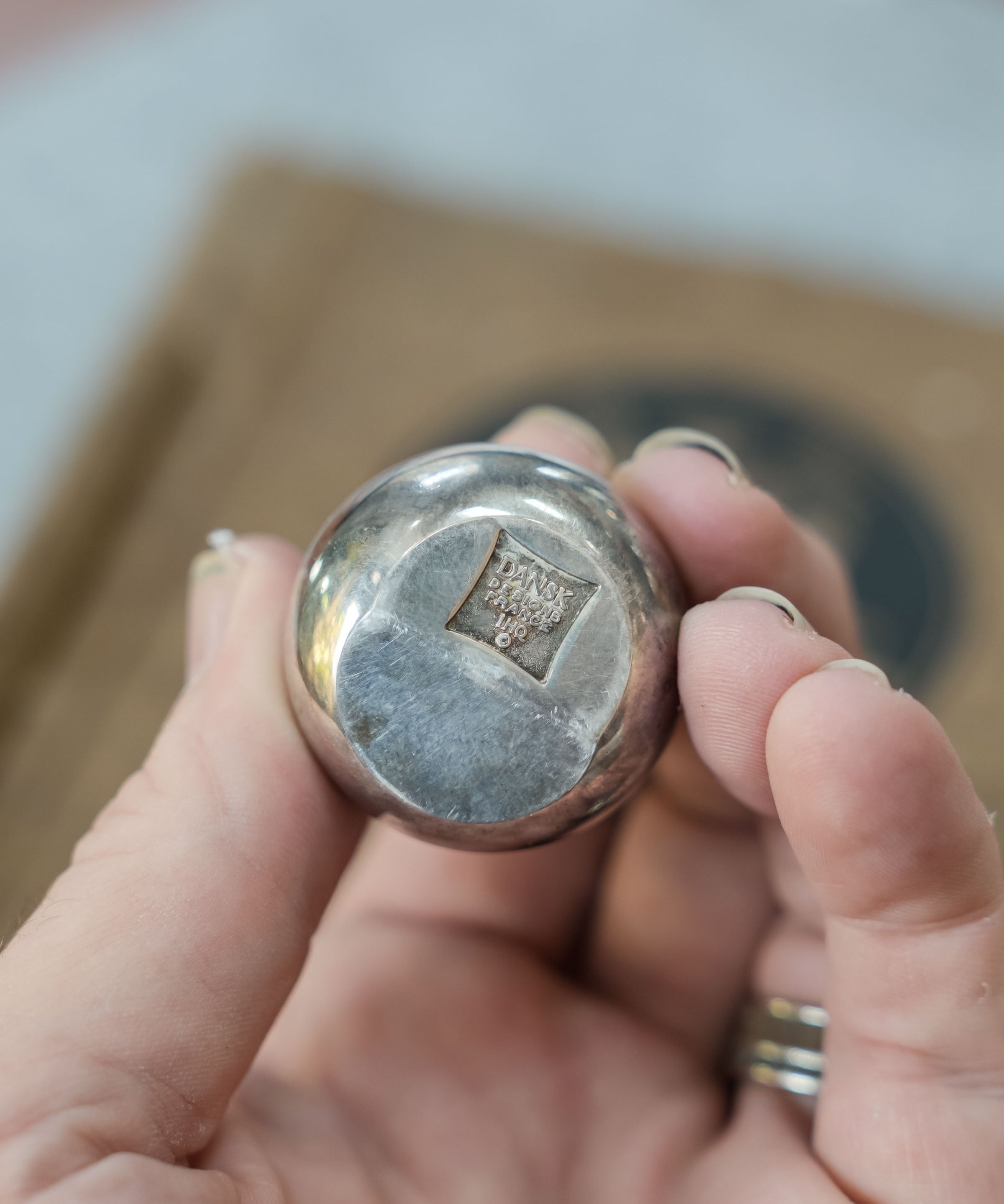 Dansk silverplate teardrop candleholders by Jens Quistgaard, close view of the mark and material