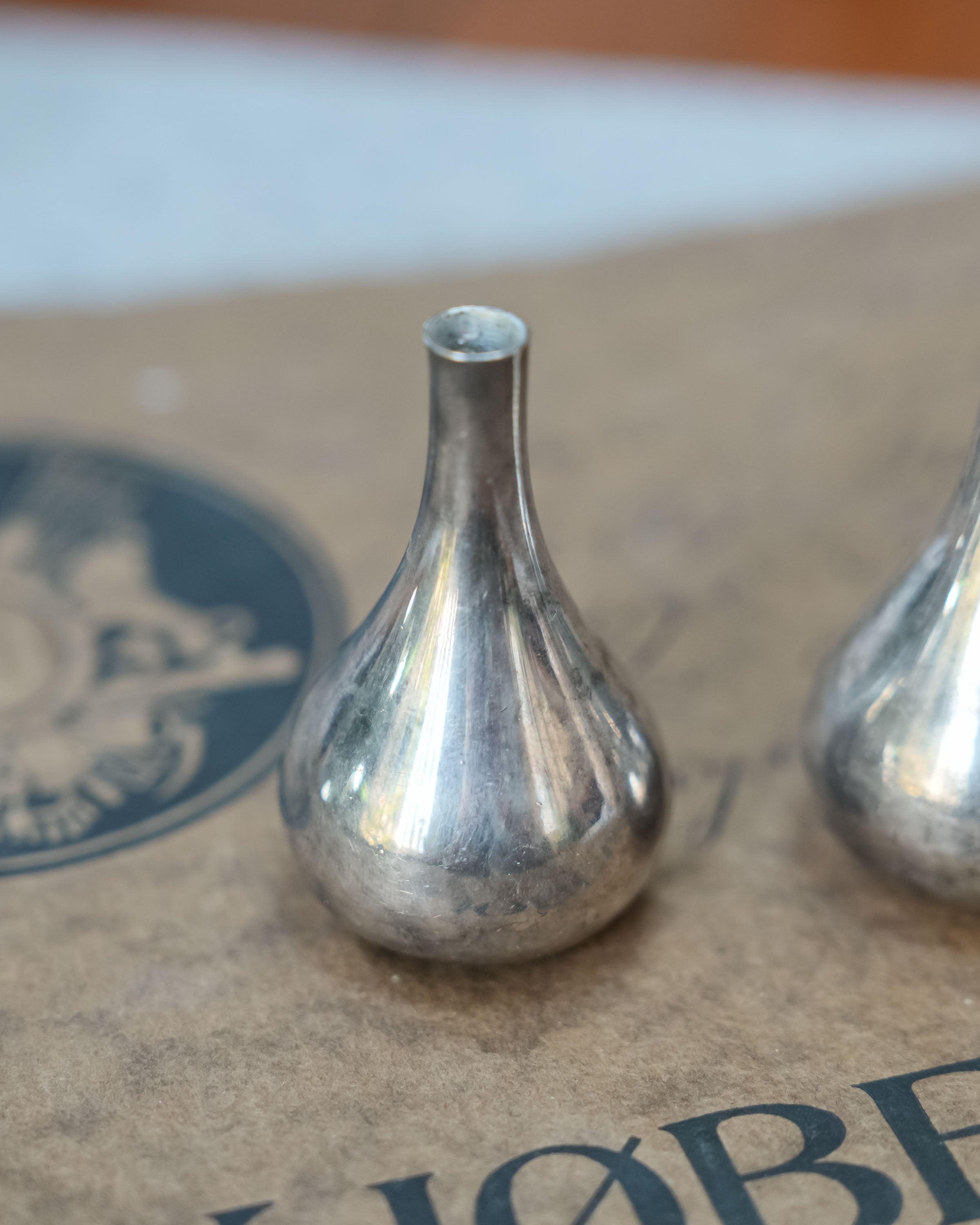 Dansk silverplate teardrop candleholders by Jens Quistgaard, in use