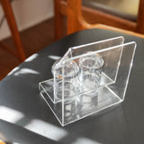 Acrylic salt and pepper shakers with napkin holder, in context on the table
